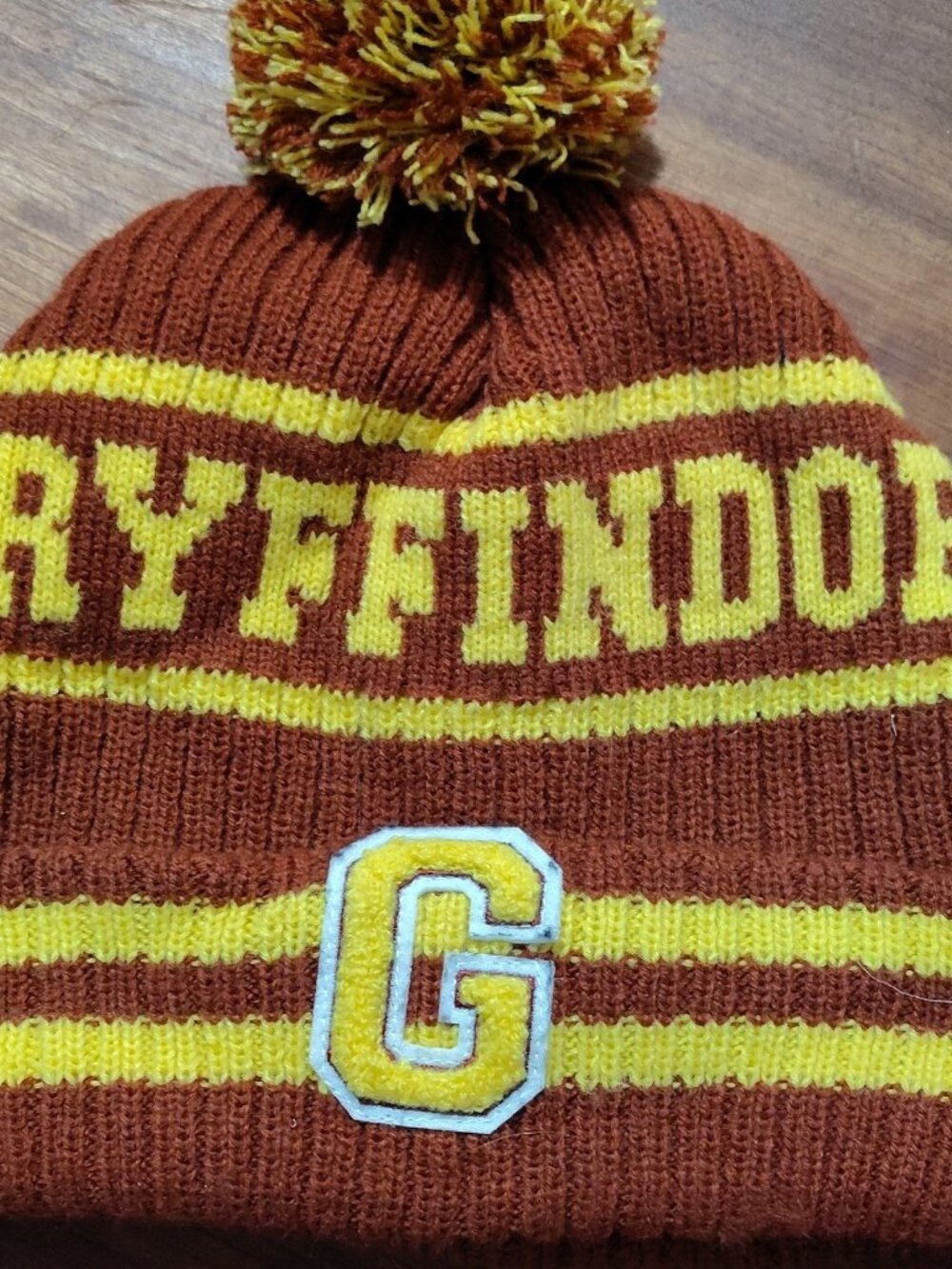 Wizarding World Harry Potter Gryffindor Knit Pom Beanie Hat w/ G Patch